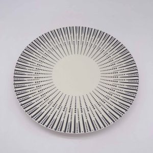 Large Black Ceramic Plate with Radiant Polka Dots